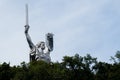 Kyiv, Ukraine - August 11, 2023: Motherland or Mother Ukraine monument. new replaced trident, Ukrainian national symbol