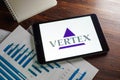 KYIV, UKRAINE - August 21, 2021. Papers with charts and Vertex Pharmaceuticals company logo. Editorial. Royalty Free Stock Photo