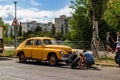 Retro car GAZ M20 Pobeda in the city street.