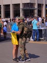 Ukrainian girl wrapped in the Ukrainian flag says goodbye to her beloved, the war of the Armed Forces of Ukraine