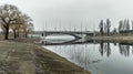 02 12 2024 Kyiv, Ukraine. Bridge in the fog. River landscape. Royalty Free Stock Photo