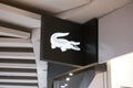 Kyiv, Ukraine, Closeup of Lacoste sign on store front, Lacoste is a french sport clothing brand