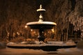 Antique cast-iron fountain, covered with snow