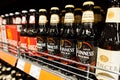 Kyiv, Ukraine - December 19, 2018: Bottles of Guinness beer on supermarket stand shelves. Guinness is an Irish dry stout that