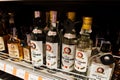 Kyiv, Ukraine - December 19, 2018: Bottles of Ron Cayo Grande Club on shelves in a supermarket