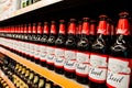 Kyiv, Ukraine - December 19, 2018: Bud beer bottles on shelves in a supermarket. Budweiser is an American-style pale lager Royalty Free Stock Photo