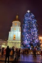 The group of people and the Bell Tower of Saint Sofias Cathedral and New Year Tree