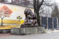 Kyiv, Ukraine - February 03, 2019: Kyiv zoo. The central entrance to the zoo. Statue of a pair of lions