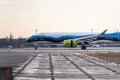 AirBaltic airlines aircraft arrived to Boryspil international airport. Airbus A-220 airplane braking action on the runway after