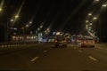 cars drive through Kyiv in the evening on a weekend. The roads of Kyiv are almost empty on weekends