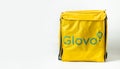 KYIV, UKRAINE - January 17: Glovo thermal yellow food bag isolated on white background. Mockup for food delivery company. Ordering