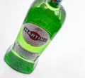 Martini Extra Dry bottle closeup famous Italian vermouth against white