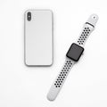 KYIV, UKRAINE - 26 JANUARY, 2018: New Iphone X smartphone model and apple watch close up. Newest Apple devices on white Royalty Free Stock Photo