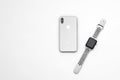 KYIV, UKRAINE - 26 JANUARY, 2018: New Iphone X smartphone model and apple watch close up. Newest Apple devices on white table in s Royalty Free Stock Photo