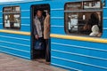 KYIV, UKRAINE - JANUARY 07, 2014: View of unknown man in the old metro carriage on the platform station