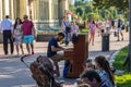 Kyiv Ukraine - Jule 15 2019: Unidentified musician plays on a piano on Mikhailovskaya Square in the center of Kyiv.