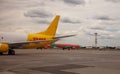 Kyiv, Ukraine - July 14, 2020: Cargo DHL plane LZ-CGT BOEING 737-400F. Yellow airplane on the platform of Boryspil International Royalty Free Stock Photo