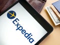 KYIV, UKRAINE - July 21, 2022. Expedia logo near a map. Royalty Free Stock Photo