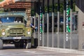 A large heavy truck is standing in a fast food restaurant.