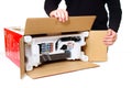 Kyiv, Ukraine - July 20, 2023: Unboxing New Canon Printer - Side View