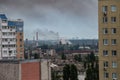 KYIV, UKRAINE - JUN 05, 2022: Kyiv rocked by blasts from Russian cruise missiles. Smoke rises over residents houses after missile