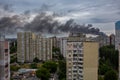 KYIV, UKRAINE - JUN 05, 2022: Kyiv rocked by blasts from Russian cruise missiles. Smoke rises over residents houses after missile