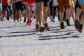 Athletes legs running half marathon Royalty Free Stock Photo