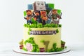 Birthday cake for a fan of Minecraft game on white background