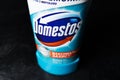 KYIV, UKRAINE - June 20, 2023 :.Domestos blue bottle household cleaning range on black background