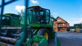 Kyiv, Ukraine - June 16, 2020: Modern John Deere combines at road at Kyiv, Ukraine Royalty Free Stock Photo