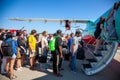 Kyiv, Ukraine - June 27, 2020: Passengers board the plane. Masked people board the flight. Airport Boryspil, Windrose Airlines