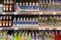 Kyiv, Ukraine, June 2023: - Rows different glass bottles of vodka stacked on shelves in supermarket for sale