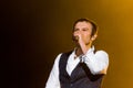 KYIV, UKRAINE - JUNE 21: Svyatoslav Vakarchuk on concert of Okean Elzy on JUNE 21 2014 in NSC Olimpiyskiy. Final concert of world