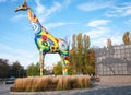 Kyiv, Ukraine - 10/21/2021: Kyiv Zoo. Sculpture of a colorful giraffe at the entrance to the zoo