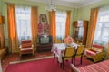 Kyiv, Ukraine - 14 Mar 2021: Old Soviet interior 50-70s style, USSR. Room with vintage furniture, aged table, chairs, sofa, decor