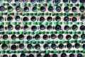 A glass bottle wall background. A wall house made from upcycled building materials Royalty Free Stock Photo