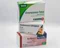 Generic antihypertensive and gastroenterology drugs closeup against white