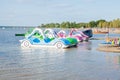 Kyiv, Ukraine- May 15 Bright colorful pedal boats at the lake beach