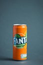 Close up shot of classic Fanta orange can on the grey background. Popular product of The Coca-Cola company Royalty Free Stock Photo