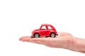 View of man holding red toy car on white Royalty Free Stock Photo