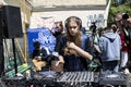 KYIV, UKRAINE - May 21 2021: DJ girl playing music on a protest action against police`s abuse of power. The protesters demand an