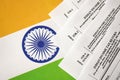 KYIV, UKRAINE - MAY 4, 2022 Indian income tax return blank forms on indian country flag