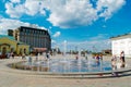 KYIV, UKRAINE - MAY 23, 2017 Kyiv. Capital of Ukraine. Happy kids have fun playing in city water fountain on hot summer day near