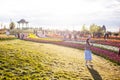 Kyiv, Ukraine - May 14, 2021: People walk in a beautiful, beautiful field with tulips