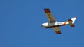 Kyiv, Ukraine - May 12, 2020: A small plane flies in the blue sky. Aircraft Cessna 172RG Cutlass RG, Reg: UR-IFC. Airplane