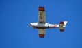 Kyiv, Ukraine - May 12, 2020: A small plane flies in the blue sky. Aircraft Cessna 172RG Cutlass RG, Reg: UR-IFC. Airplane