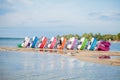 Kyiv, Ukraine- May 15, Stacked catamarans on the lake. Bright colorful pedal boats at the lake beach