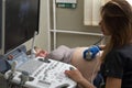 Ultrasound examination of the fetus of a pregnant woman. Apparatus for ultrasound examination. Ultrasonic scanner.