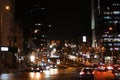 KYIV, UKRAINE - MAY 22, 2019:  of illuminated city street with road traffic and buildings Royalty Free Stock Photo