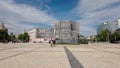 Kyiv, Ukraine - May 26, 2022: Young couple walking near Bogdan Khmelnitsky Statue on Sofiyivska square in Kiev.